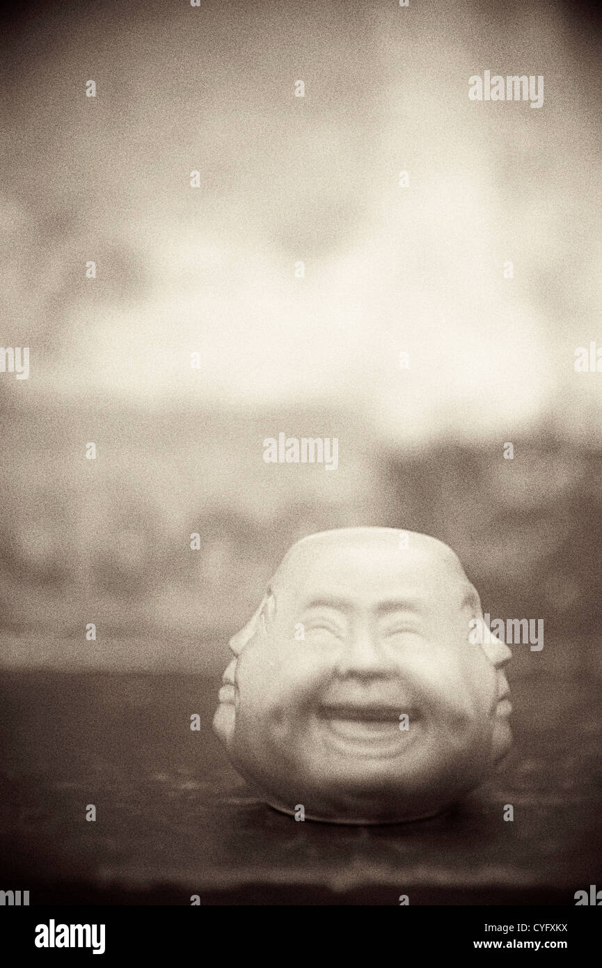 Strange Chinese multiple faced object. Stock Photo