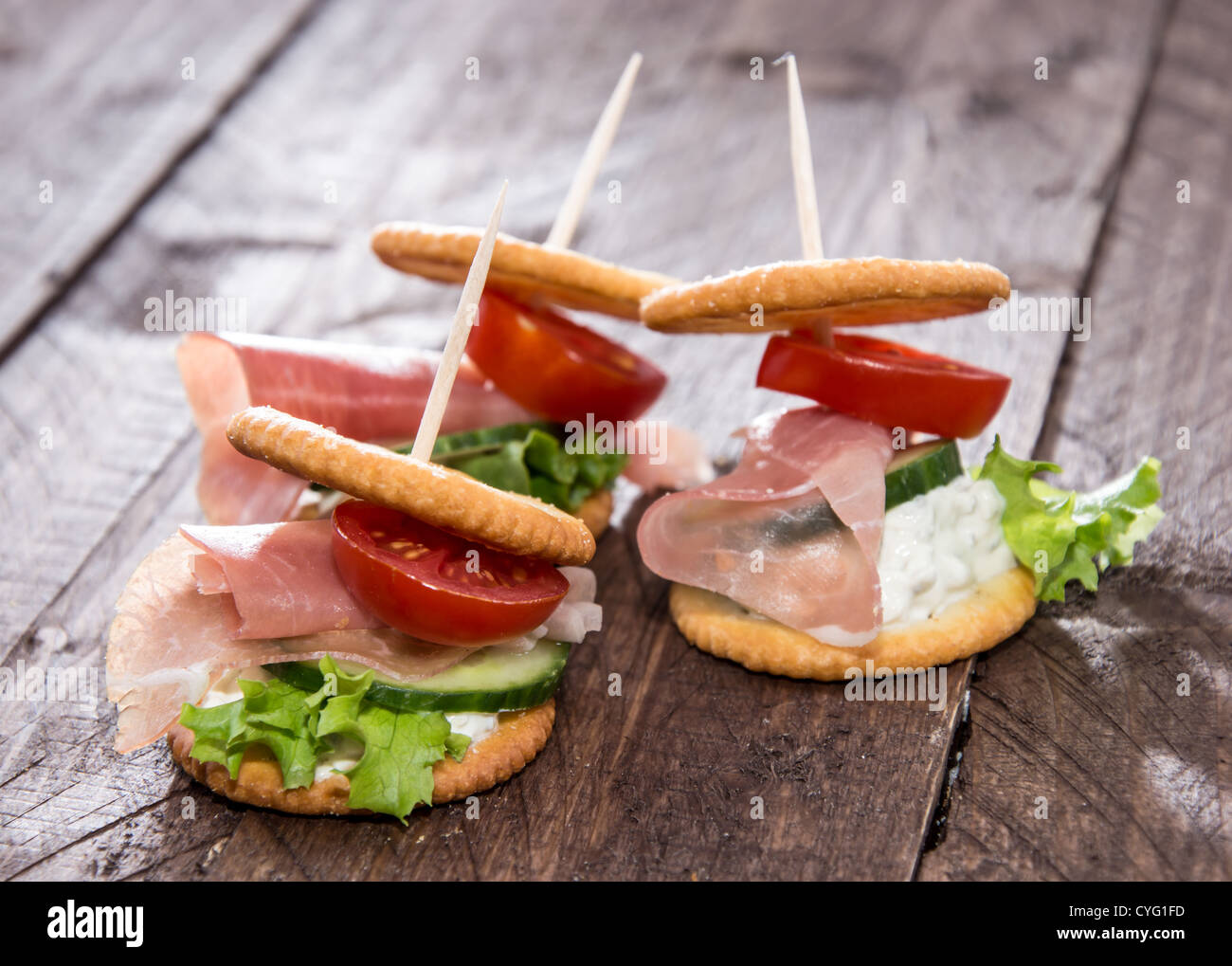 Crackers with Ham, Cream Cheese and Vegetables Stock Photo Alamy