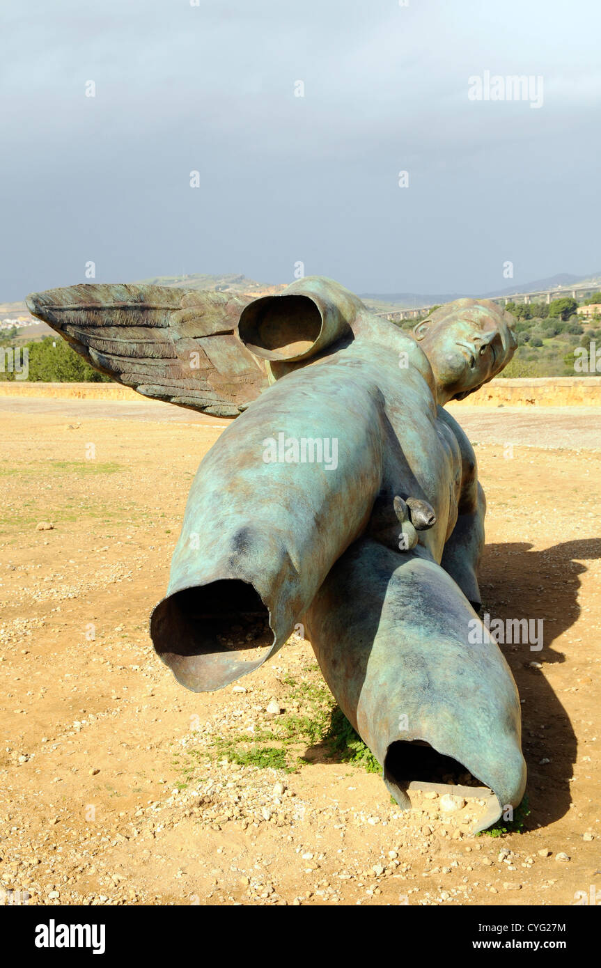 Bronze sculpture Ikaro Caduto (Fallen Icarus) by polish artist Igor Mitoraj in the Valley of the Temples, Agrigento, Sicily Stock Photo