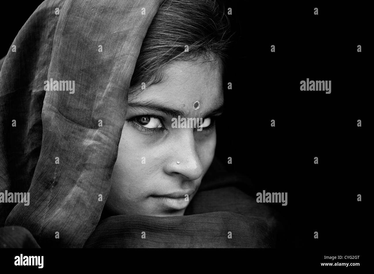 Indian girl staring Black and White Stock Photos & Images - Alamy