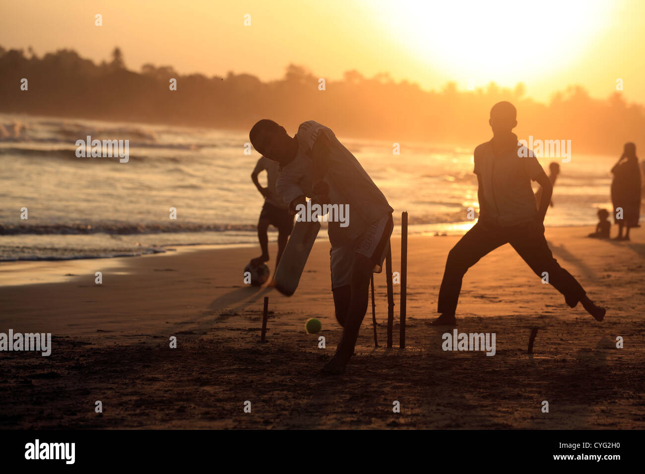Sunset beach cricket on Weligama Beach on the Sri Lankan south coast. Stock Photo