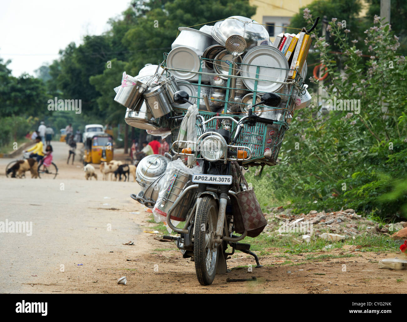 Stock photo of Typical rural transport, overloaded van with people,  Maharashtra, India. Available for sale on