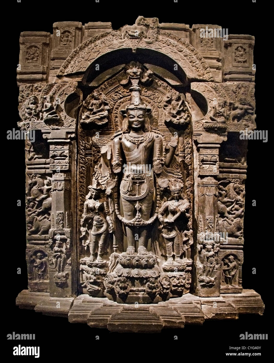 Vishnu with His Consorts, Lakshmi and Sarasvati Pala 11th–12th century India Bihar or West Bengal or Bangladesh Black stone Stock Photo