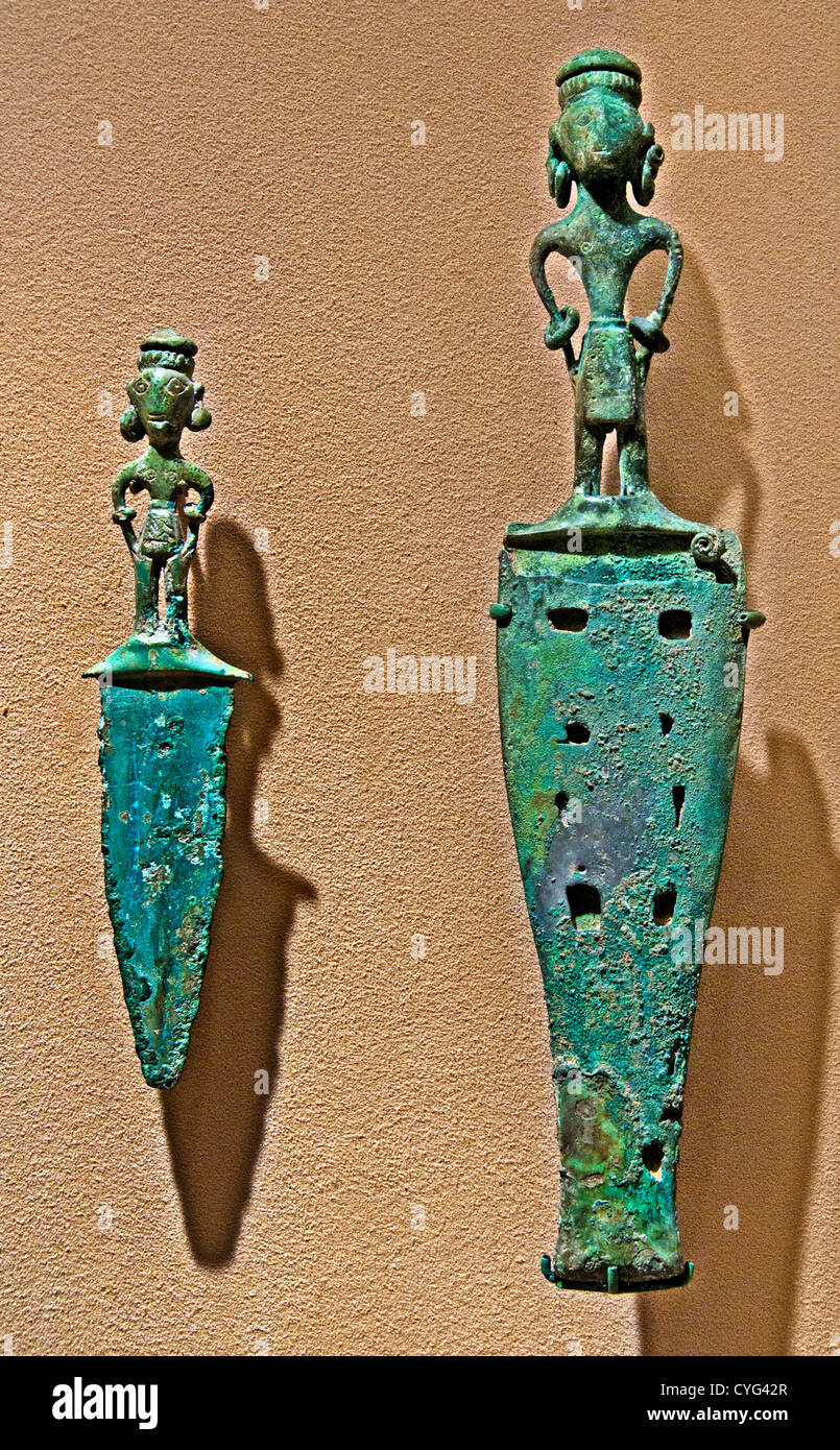 Male Daggers Bronze and Iron Age Dongson 500 B.C.–A.D. 100 Vietnam Vietnamese Bronze 18 cm and 28.5 cm Stock Photo