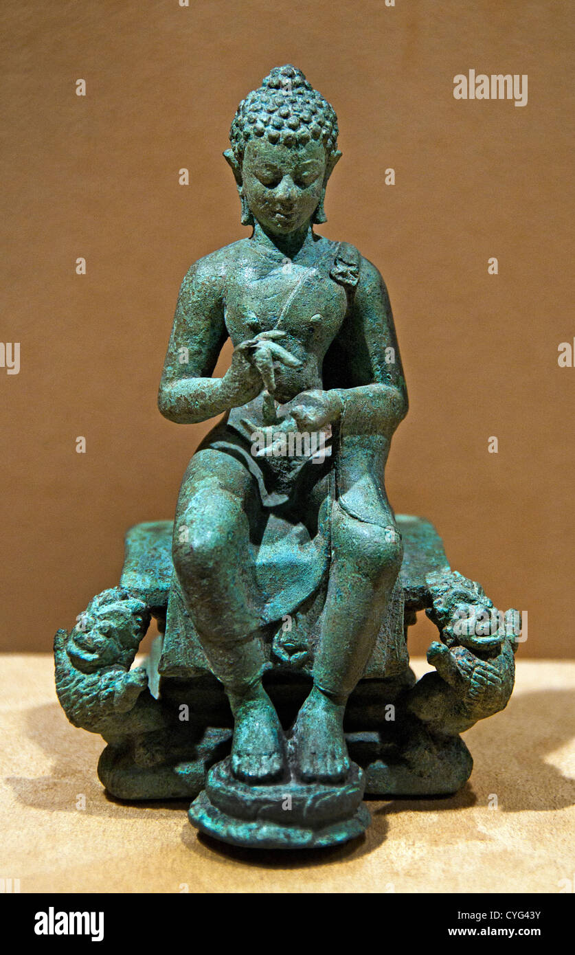 The Transcendent Buddha Vairochana Seated in Western Fashion Central Javanese 9th century Indonesia Java Bronze 13 cm Stock Photo