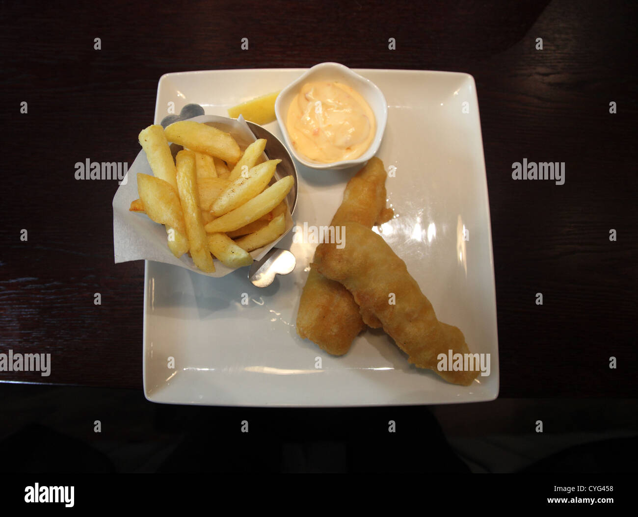 Beer-battered cod and chips, served Zuni, gourmet restaurant, Kilkenny, Ireland Stock Photo