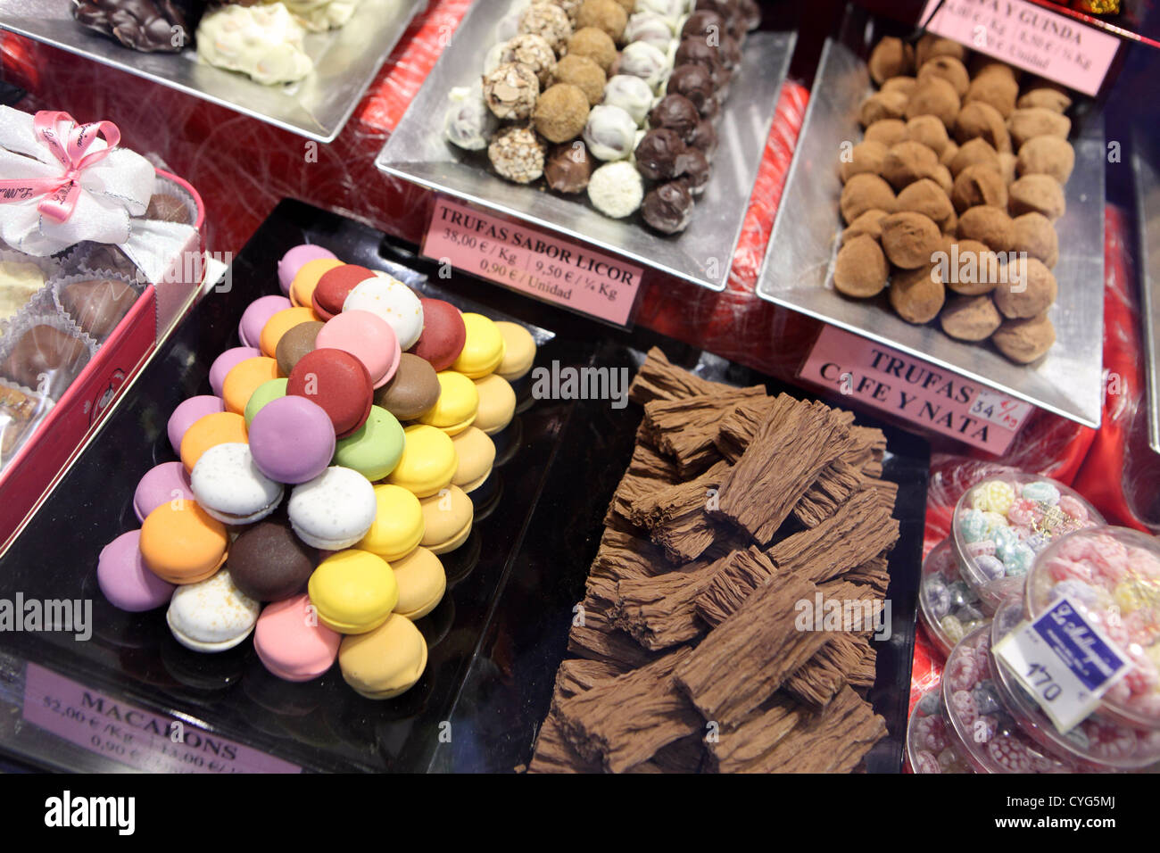 Sweets chocolates for sale sweetshop Pasteleria traditional bakery, Madrid, Spain Stock Photo