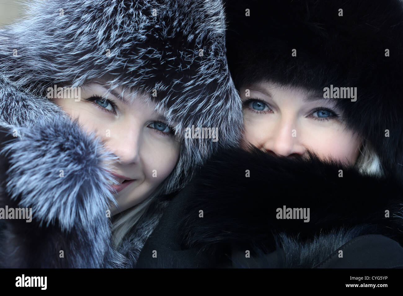 Beautiful woman in winter fur coat Stock Photo