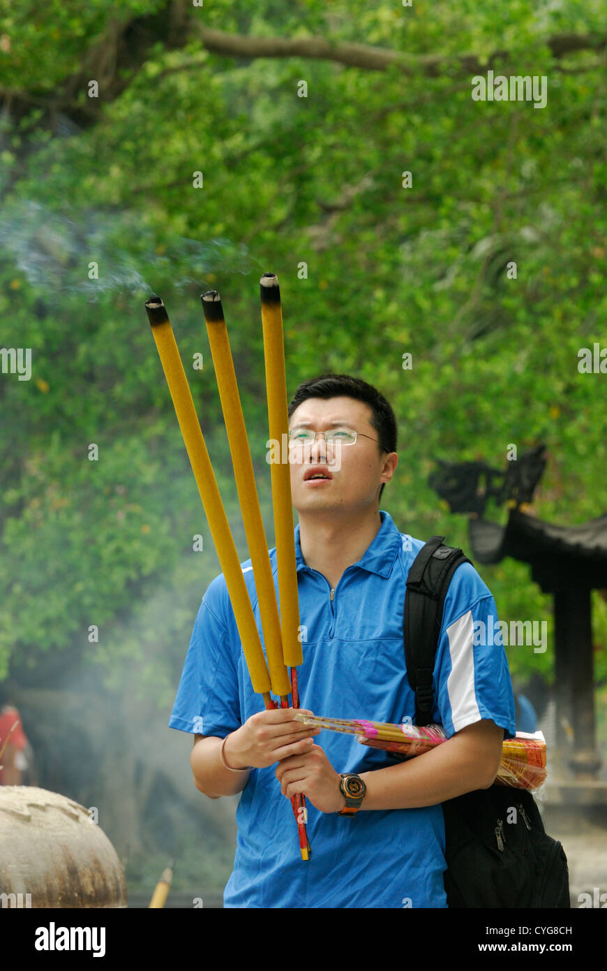 Buddhist ritual of Incense offerings at the entrance of Po LIn Monastery, Ngong Ping Plateau