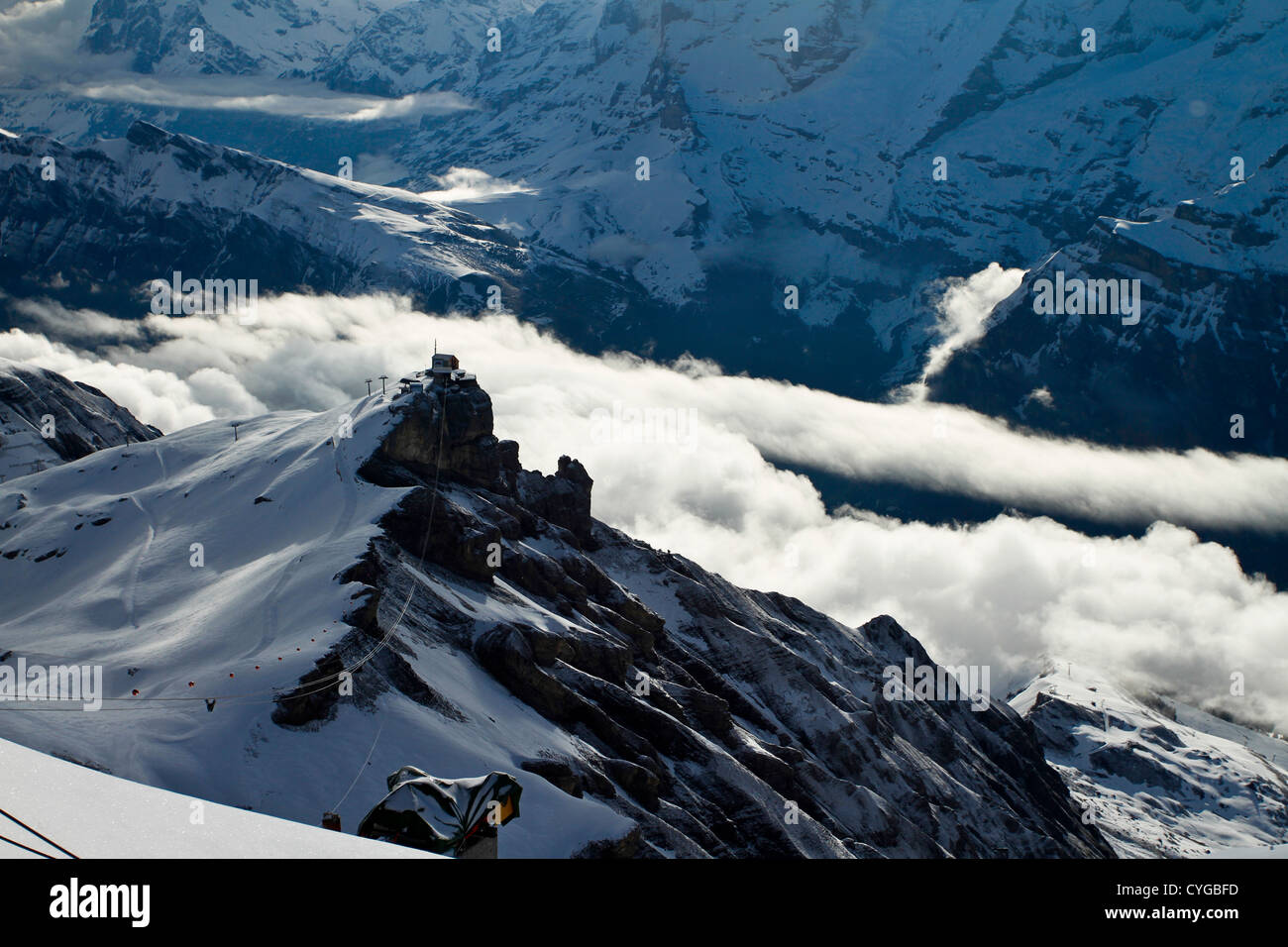 Cable car station at Birg. Swiss Alps, Berner Oberland. Viewed from Piz Gloria atop the Schilthorn Mountain. Stock Photo