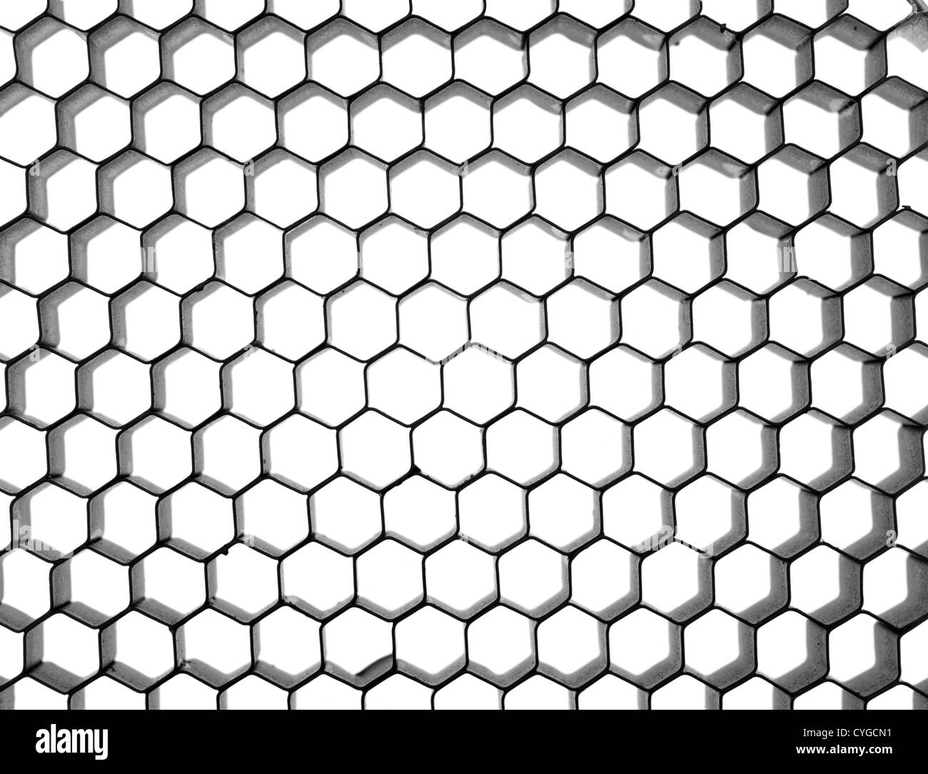 A honeycomb background image over a white background Stock Photo