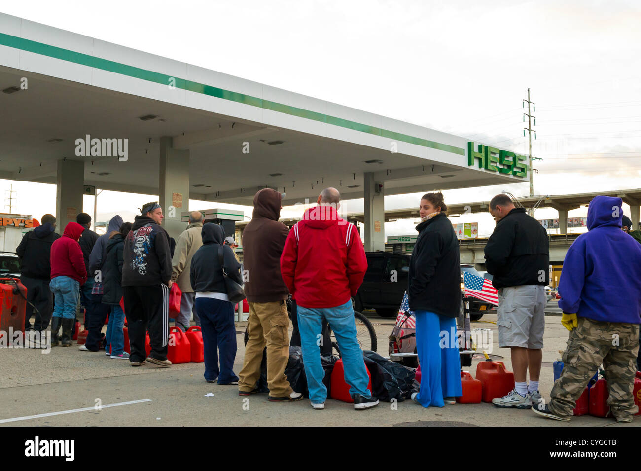 Nov. 3, 2012 Merrick, New York, U.S. People carrying gas containers