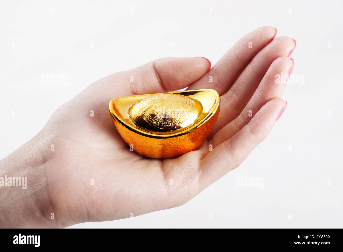 Chinese traditional currency gold yuanbao ingots Stock Photo - Alamy