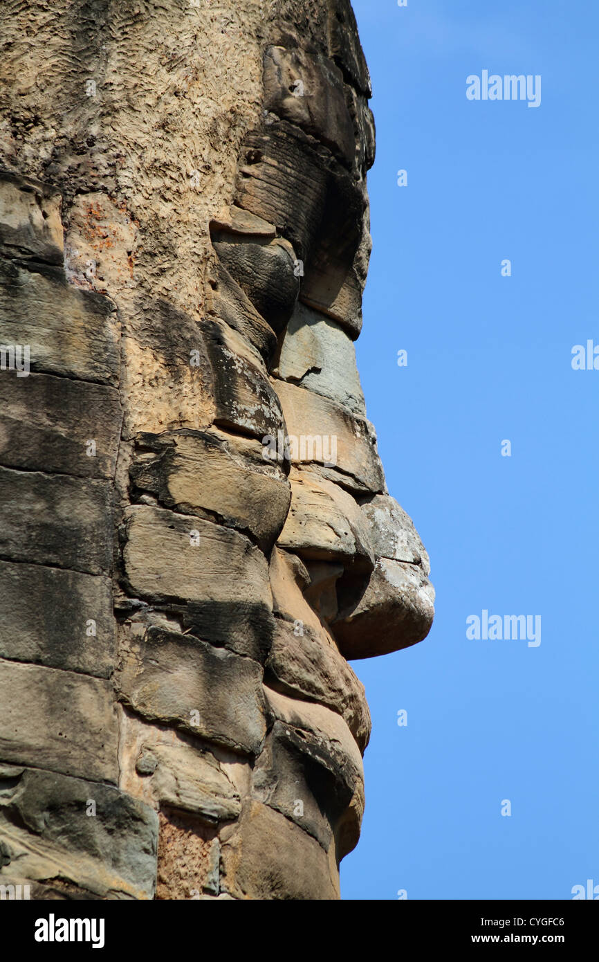 Giant Stone Face of Wat Bayon in the Angkor Temple Park, Cambodia Stock