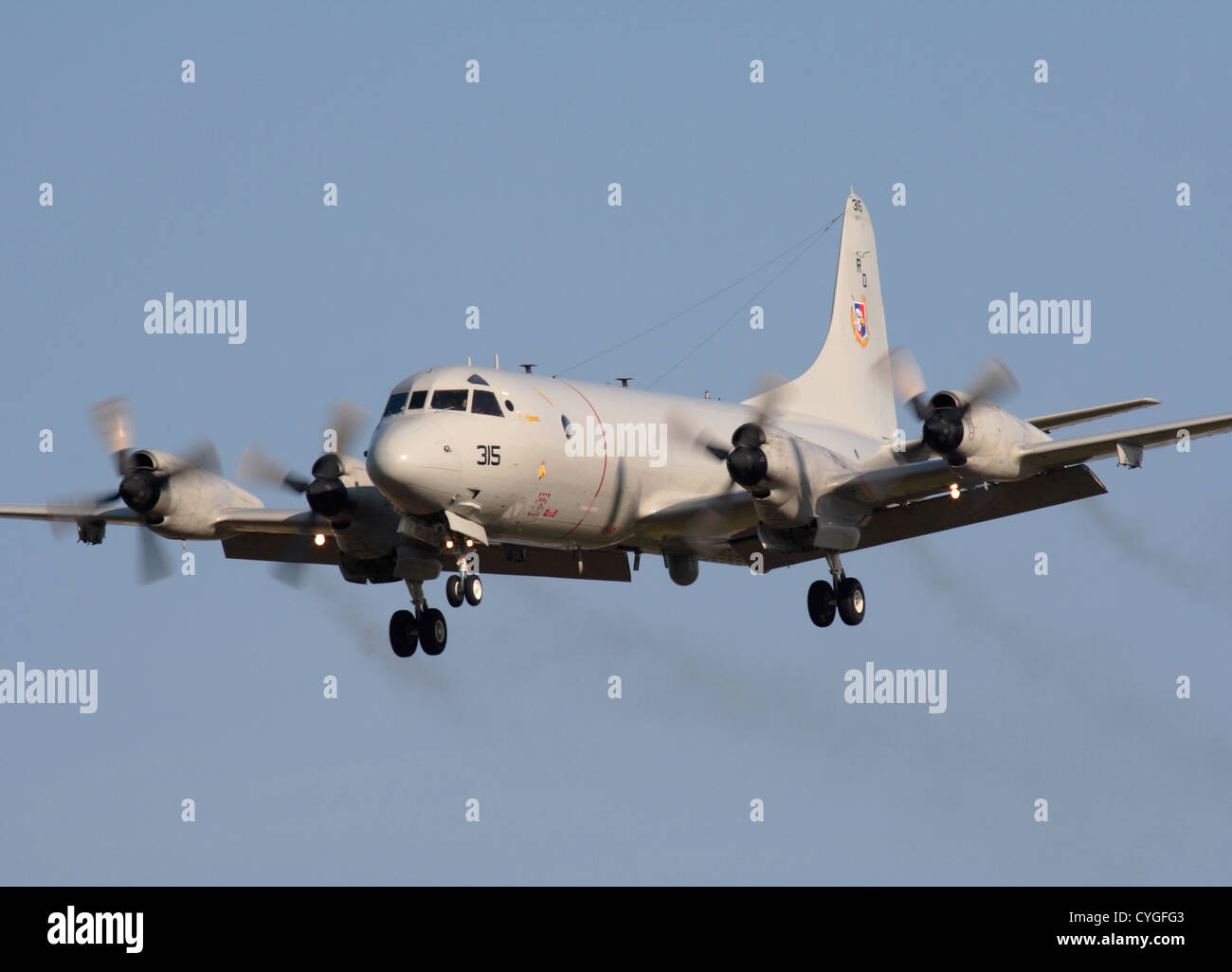 US Navy Lockheed P-3C Orion anti-submarine patrol airplane trailing exhaust while on approach Stock Photo
