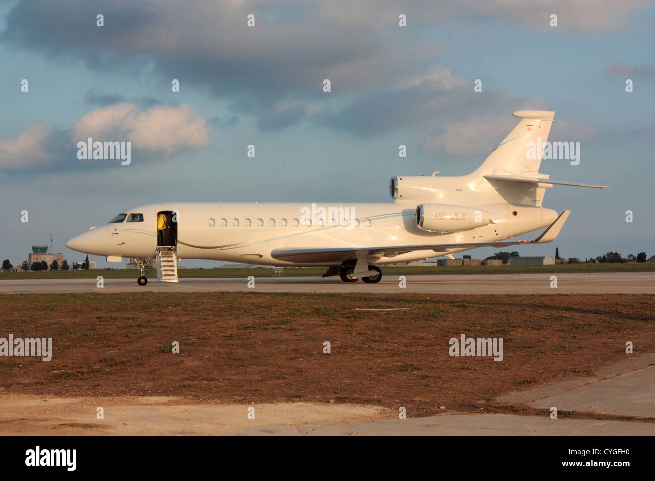 Dassault Falcon 7X business jet preparing for departure. The 7X is the flagship of Dassault's Falcon range of private jets. Stock Photo