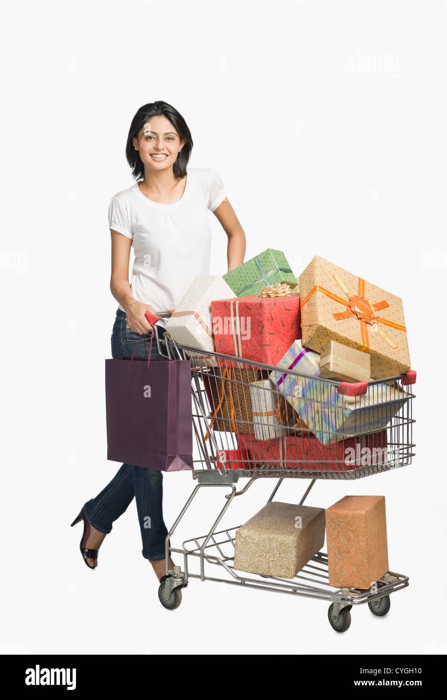 Woman pushing a shopping cart hires stock photography and images Alamy