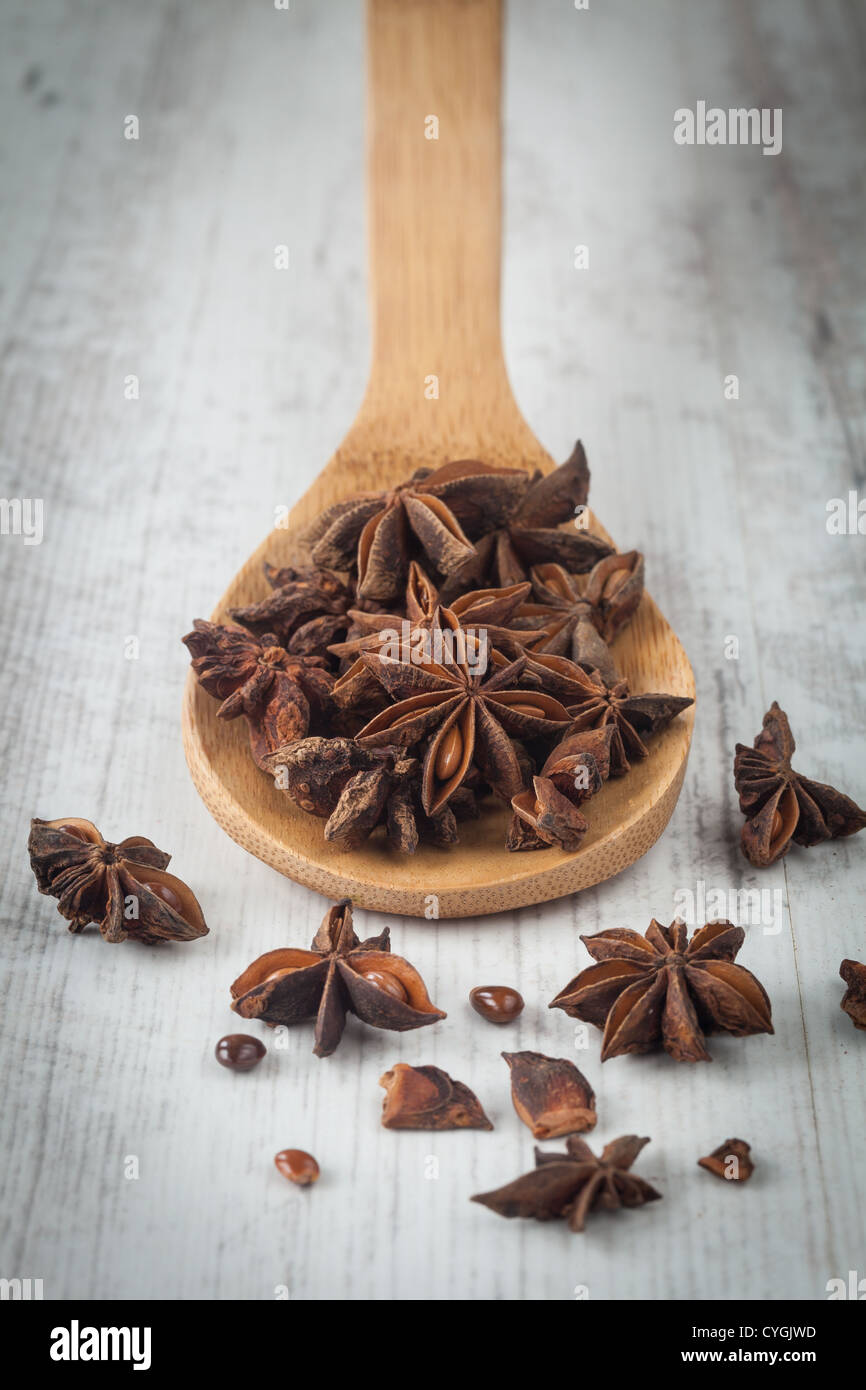 Star anise on a wooden spoon Stock Photo