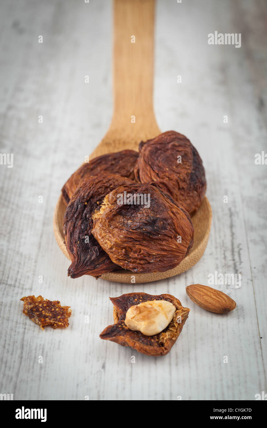 Home made dried fig fruits on a wooden spoon Stock Photo