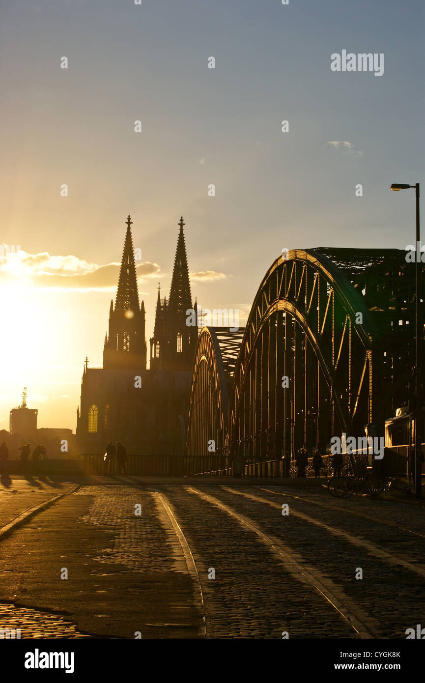 Cologne cathedral, Koln, Nordrhein-Westfalen, Germany at sunset from Hohenzollern bridge Stock Photo