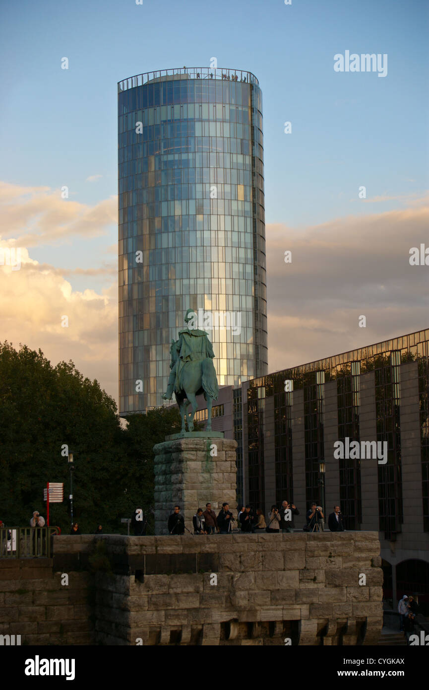 Kölntriangle office block, Cologne, Köln, Nordrhein-Westfalen, Germany, at sunset seen from Frankenwerft, equestrian statue of Kaiser Wilhelm l, 1864 Stock Photo