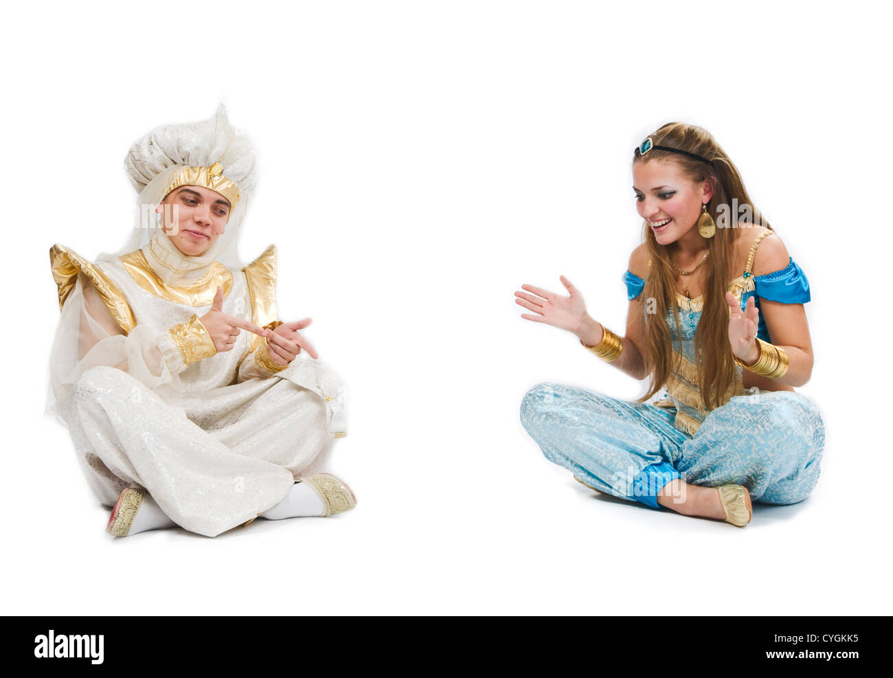 Aladdin and Jasmine - man and woman wearing costume of Arabian Nights prince and princess Stock Photo
