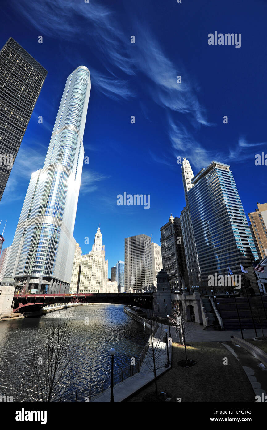 tall building along chicago river with blue sky Stock Photo - Alamy