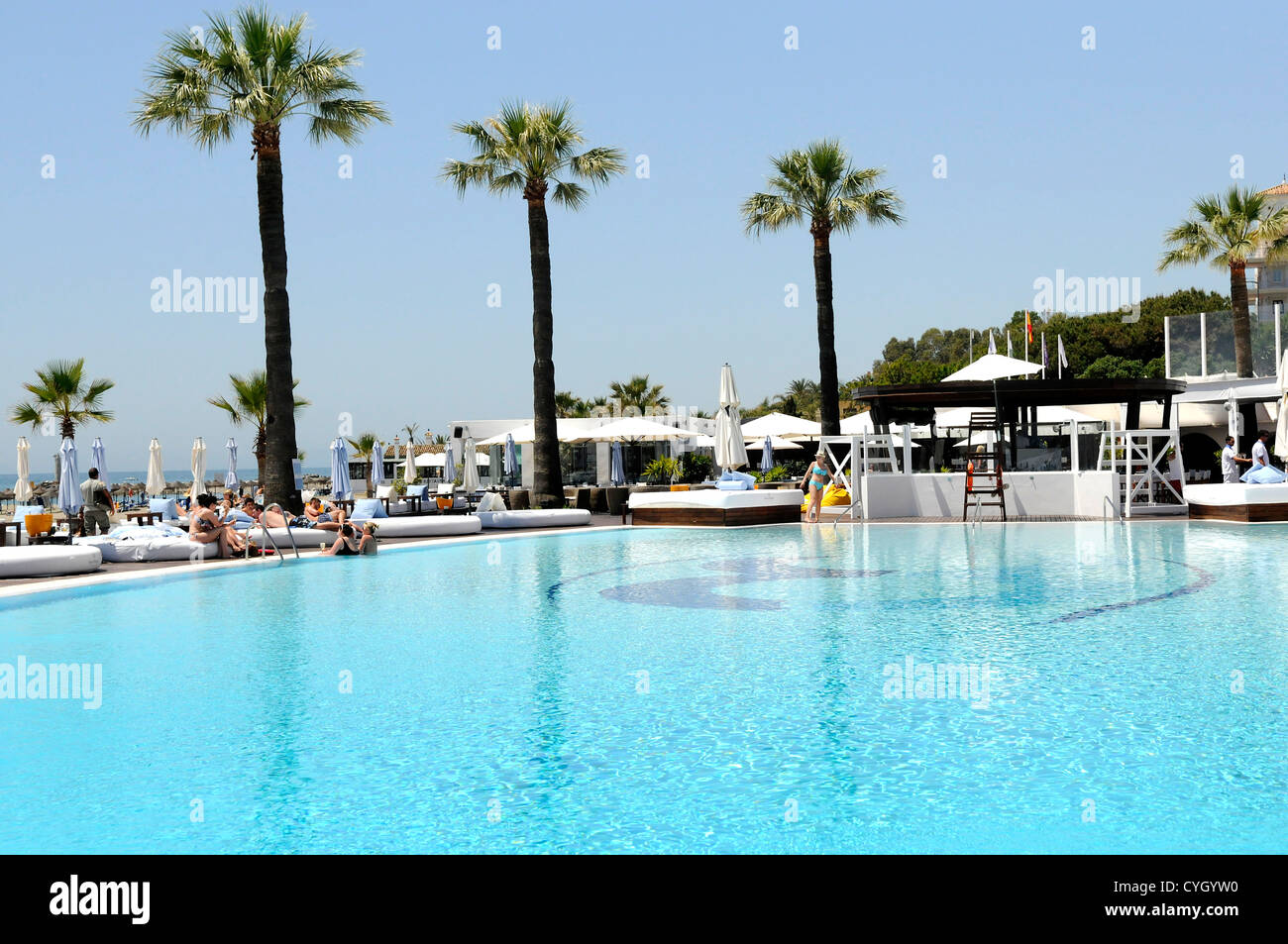 Sunny swimming pool holiday hi-res stock photography and images - Alamy