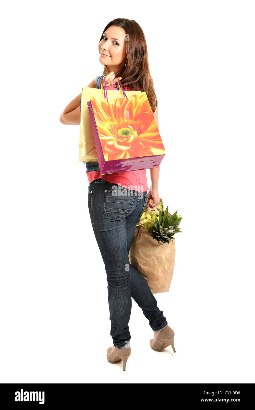 Happy woman with shopping bags and groceries Stock Photo