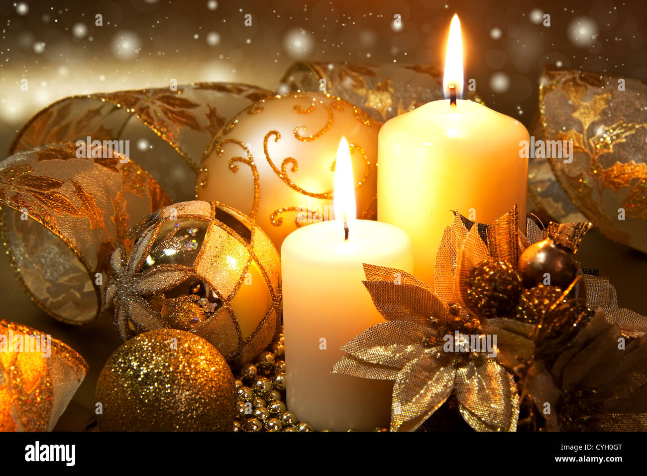 Christmas decoration with candles over dark background Stock Photo - Alamy