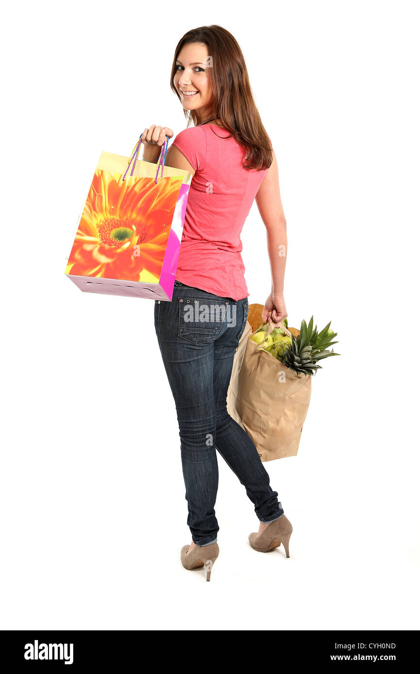 Happy woman with shopping bags and gifts Stock Photo