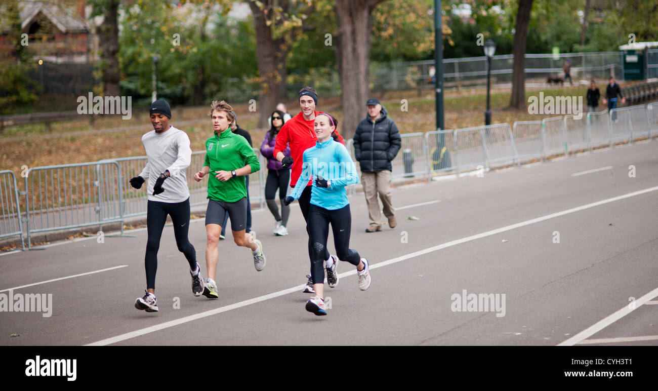 Runners exercise in Central Park near the finish line for the 43rd