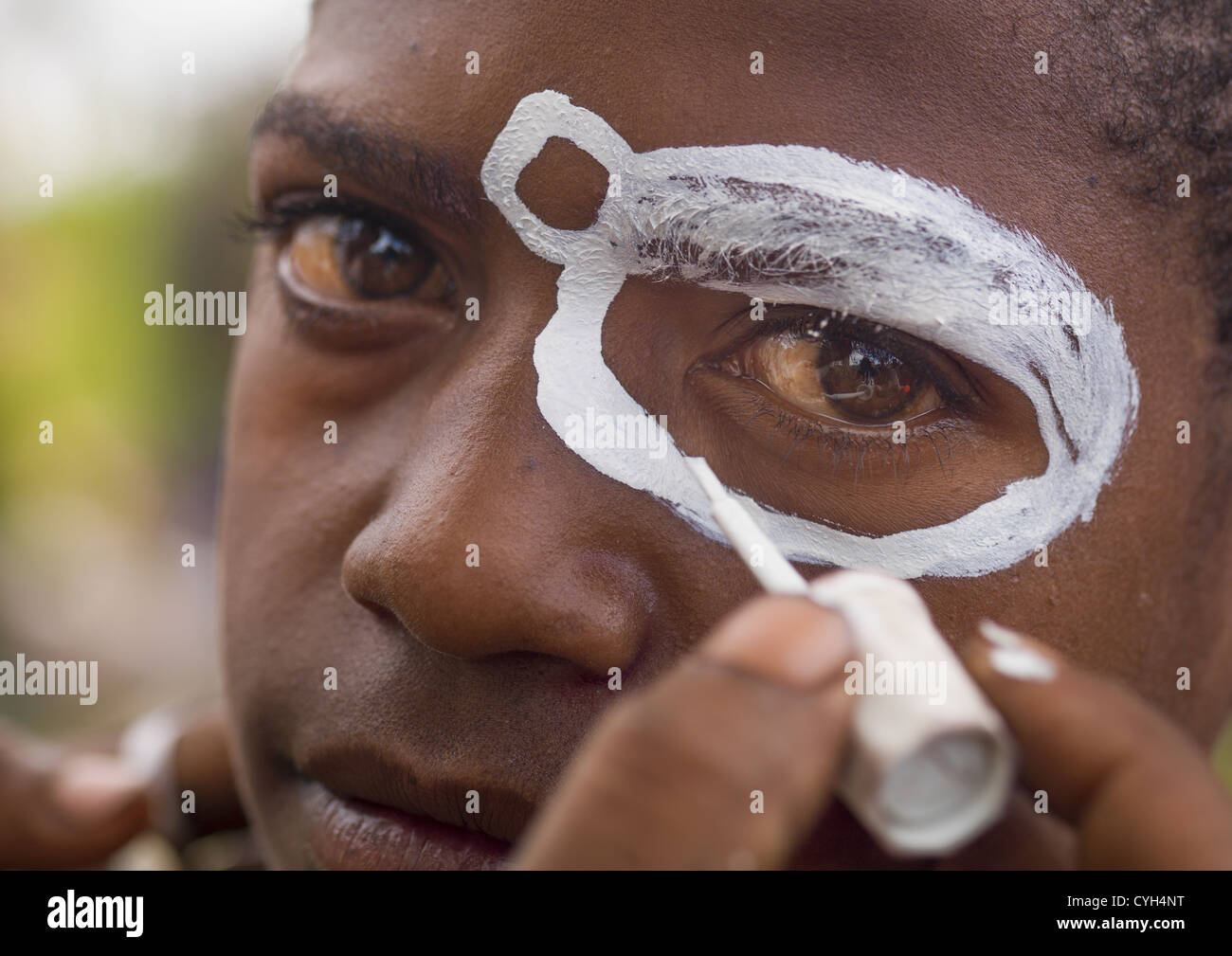 Melpa Tribe Kid Make Up During Mt Hagen Sing Sing, Western Highlands, Papua New Guinea  Stock Photo