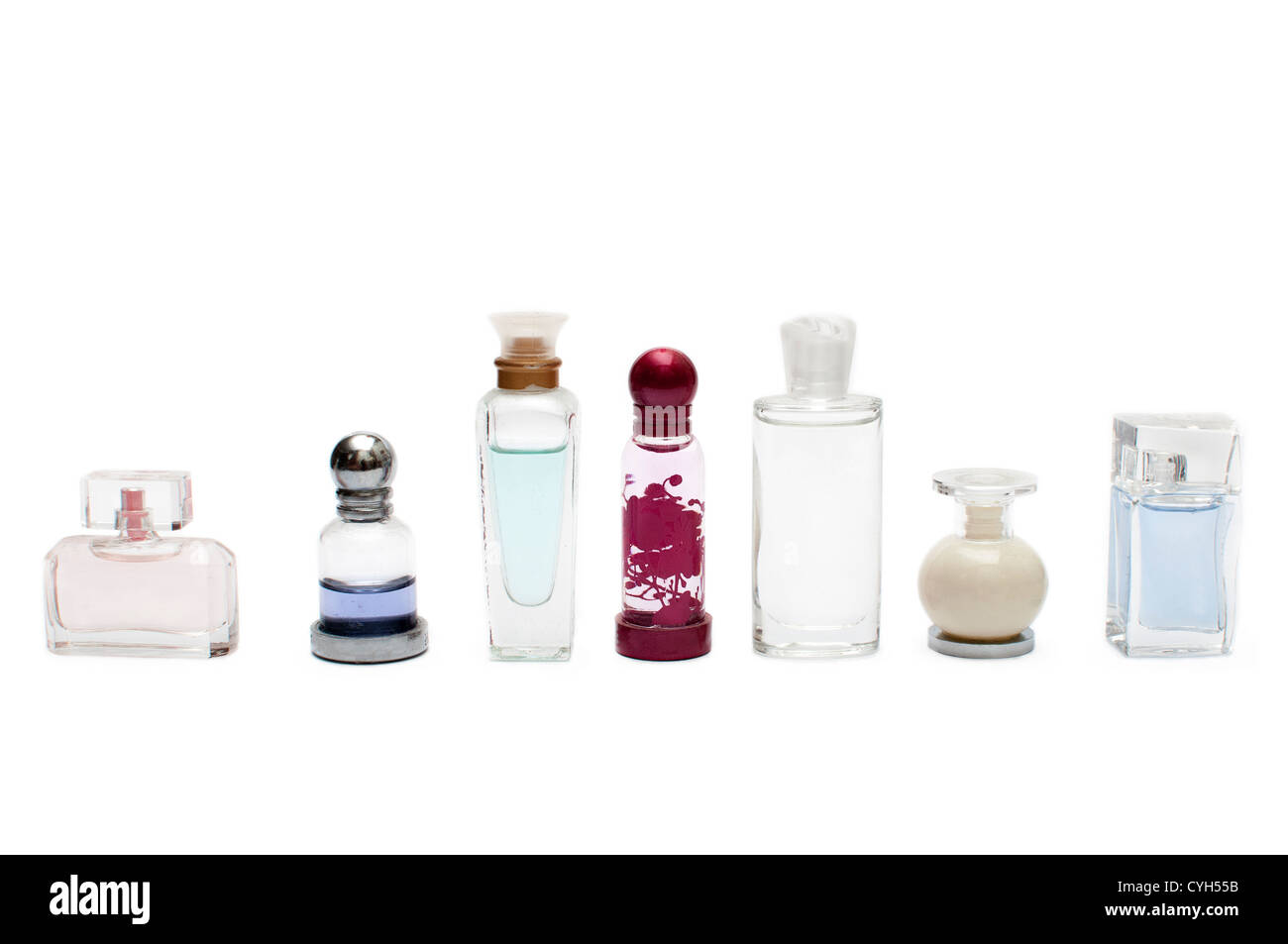 Miniature perfume bottles isolated on white background Stock Photo - Alamy