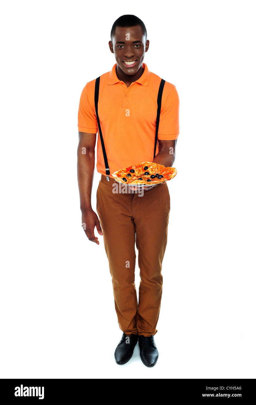 Full length portrait of delivery boy with pizza isolated over white Stock Photo