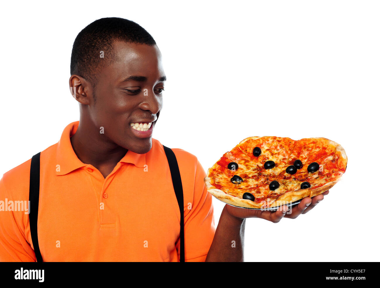 Smiling young black man holding yummy pizza against white background Stock Photo