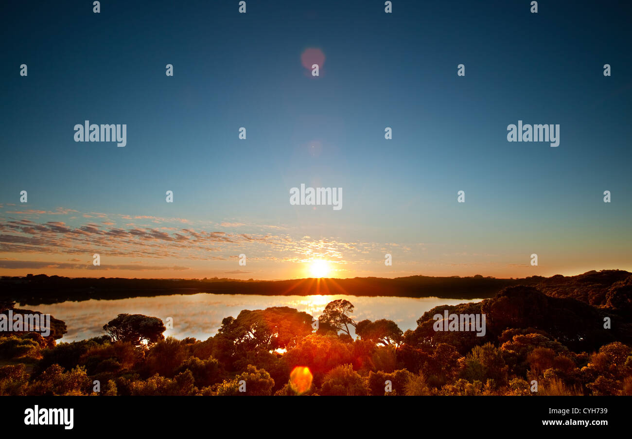 The sun rises over a peaceful lake in South Australia Stock Photo - Alamy