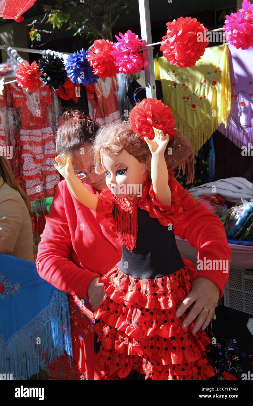 Doll dressed as flamenco dancer, street market stall, El Rastro sunday market, Madrid, Spain Stock Photo