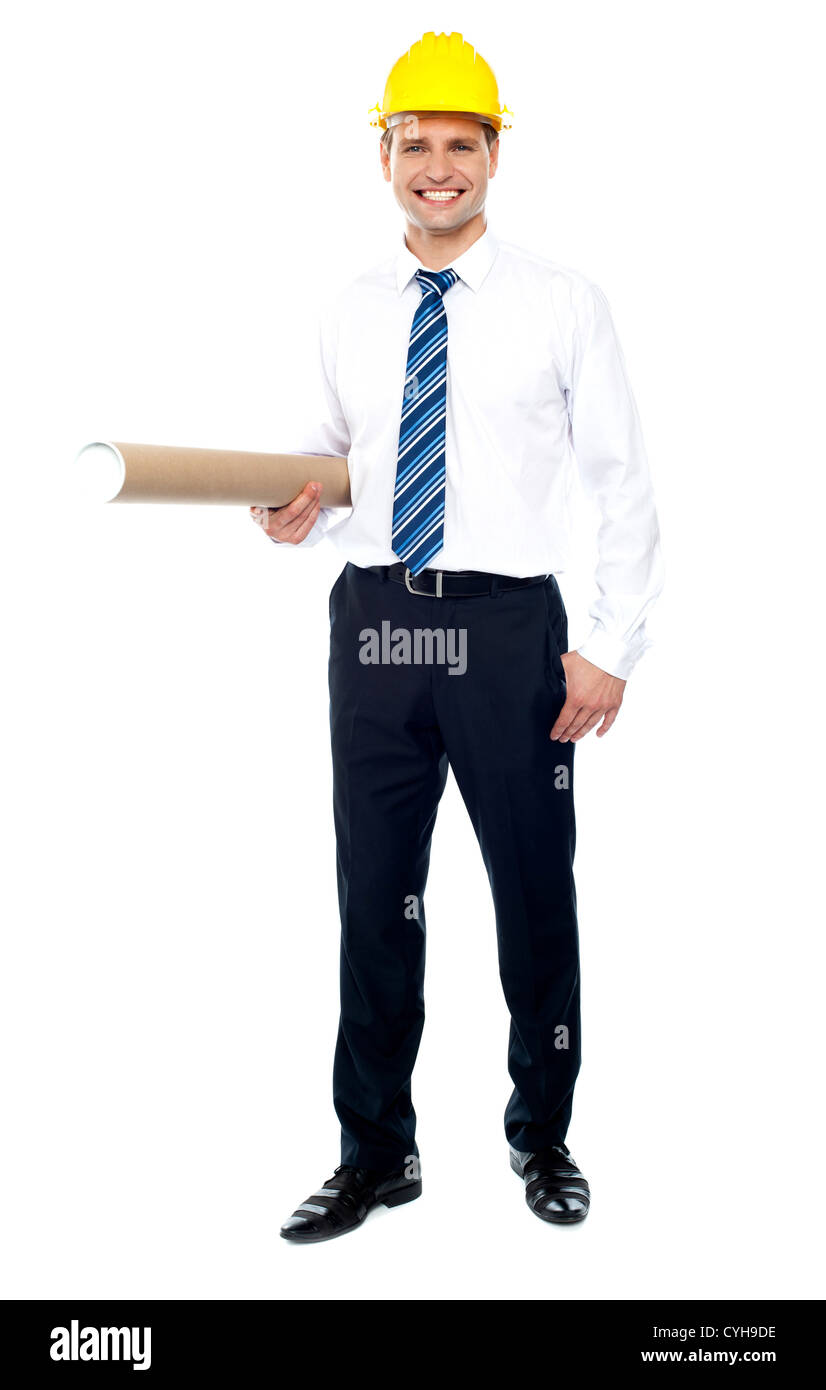 Civil engineer holding blueprint and wearing yellow safety helmet Stock