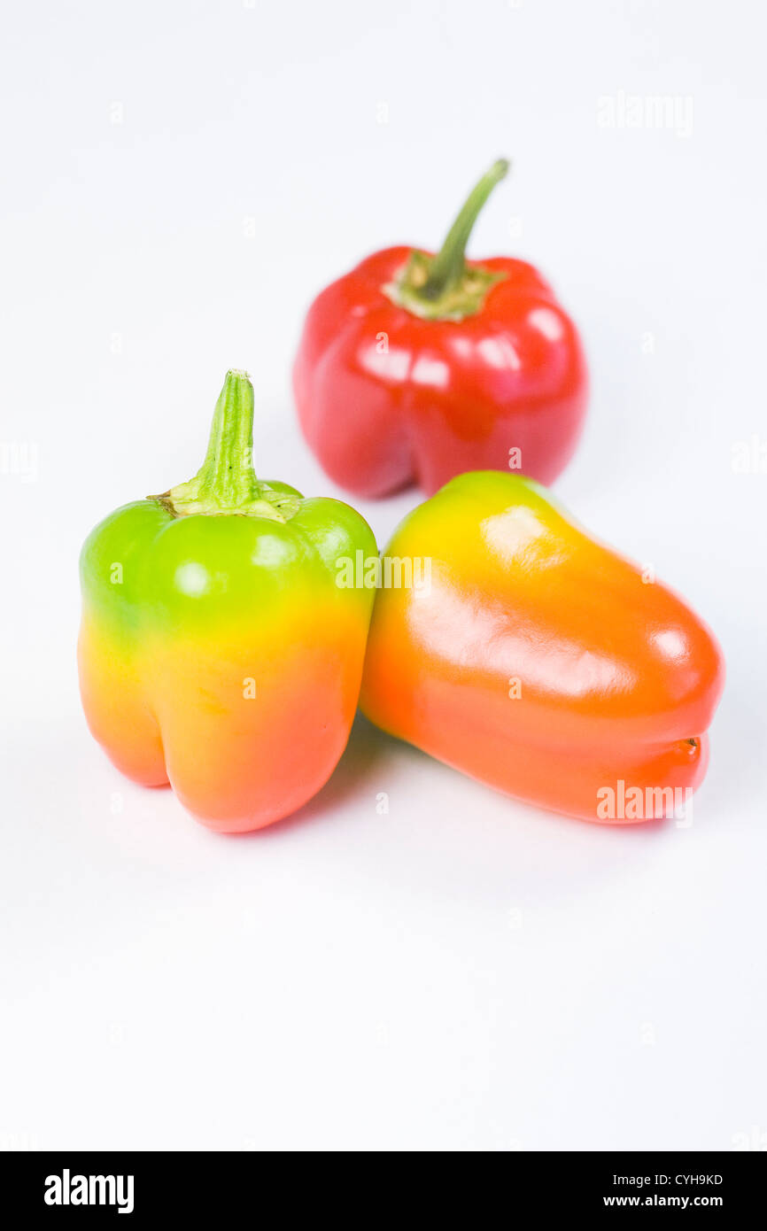 Three sweet peppers isolated on a white background Stock Photo Alamy