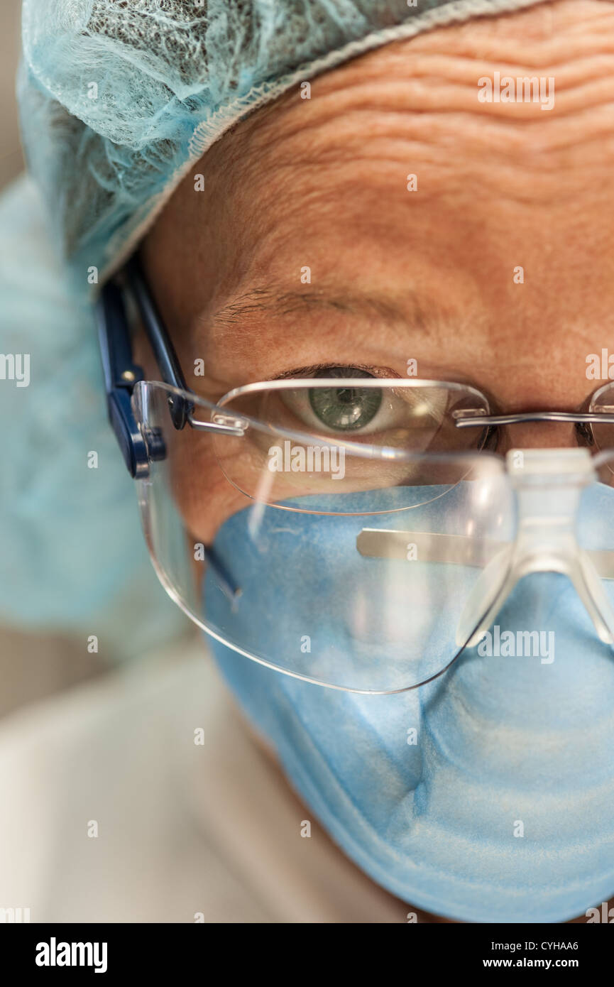 Scientist in necropsy lab wearing safety equipment Stock Photo