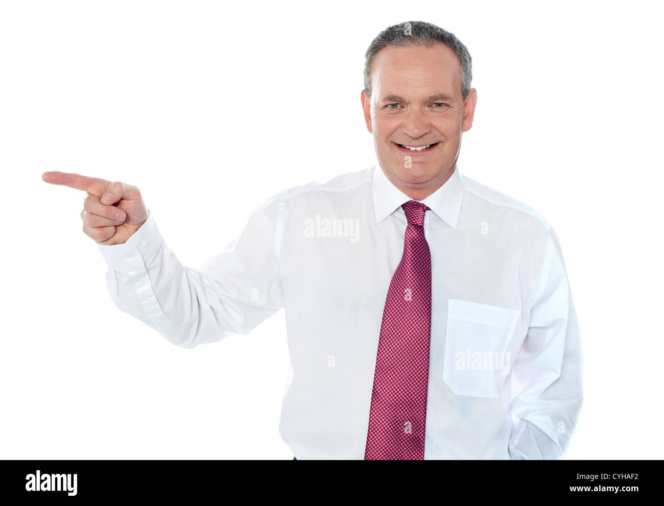 Old caucasian male executive pointing away isolated on white background ...