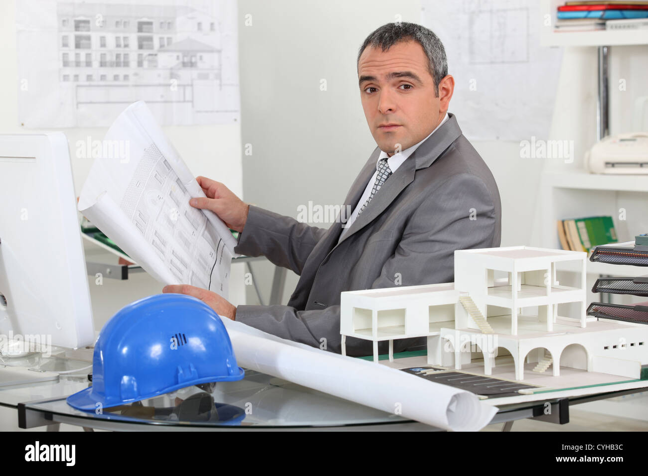 Man with plans Stock Photo
