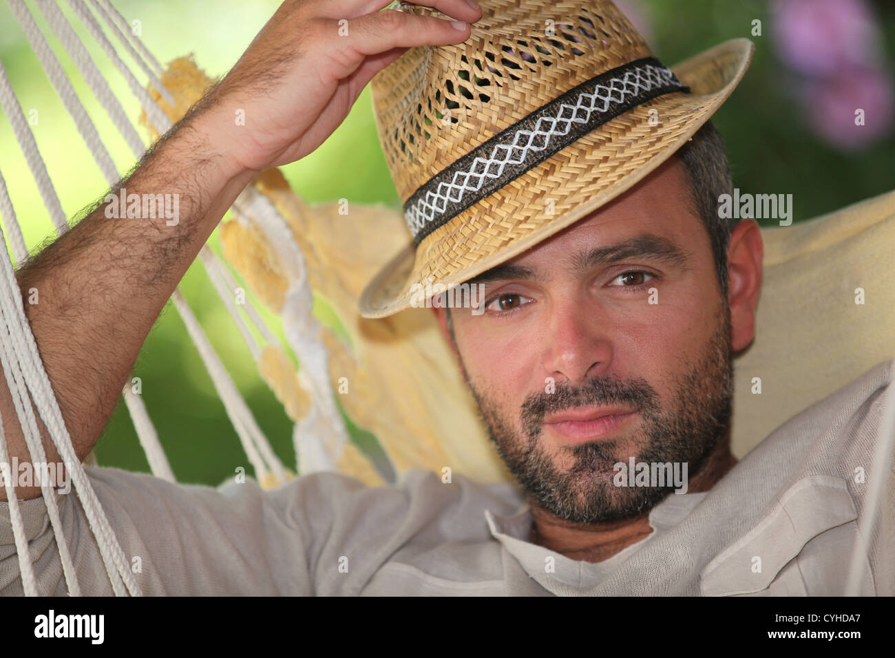 Senior Man Relaxing In Hammock High Resolution Stock Photography and ...
