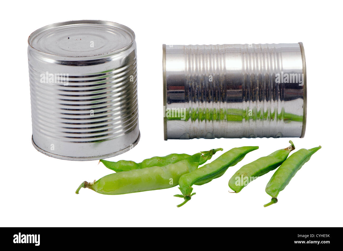 Pickled preserve pease in metal tin can pot and fresh one on top. Food prepare for winter. Stock Photo
