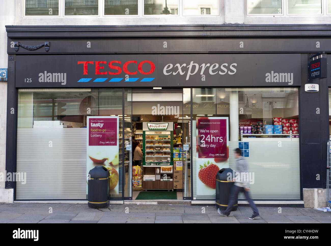 London, UK. 5/11/2012. (Pictured) People walking past a Tesco Express store  Credit Photo: Peter Barbe / Alamy Stock Photo