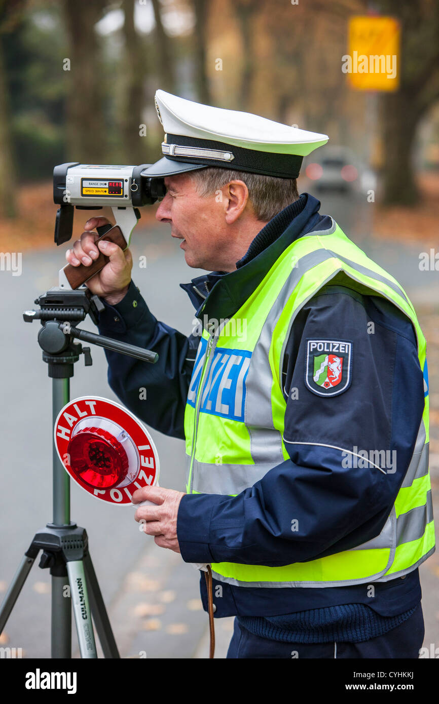 Police speed control. Laser measuring of car speed Stock Photo Alamy