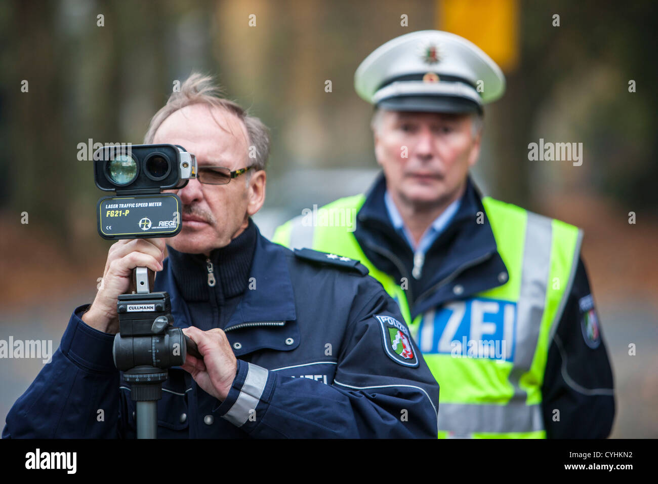 Police speed control. Laser measuring of car speed Stock Photo Alamy