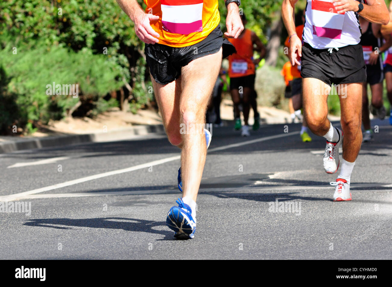 Group of marathon racers running Stock Photo - Alamy