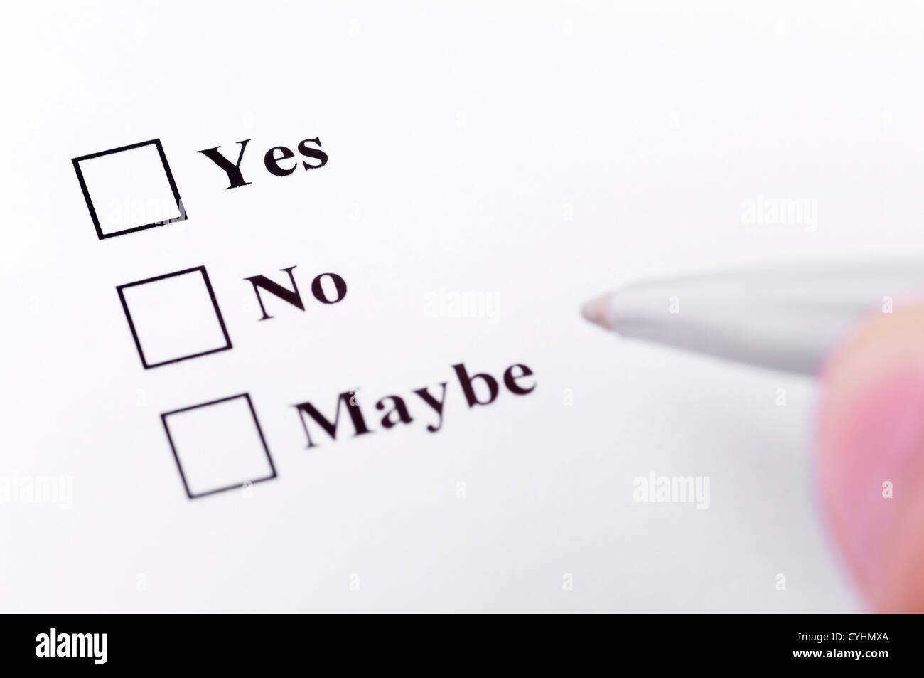 Making your decision. About to choose between yes, no, maybe. Stock Photo